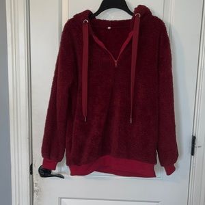 Burgundy, sherpa fleece quarter zip, size medium.